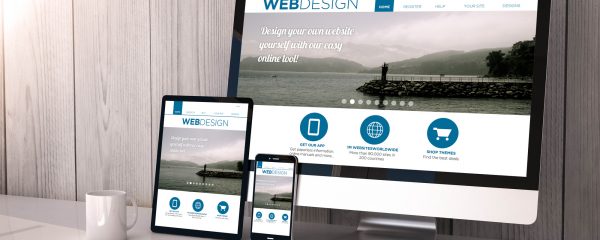 Digital generated devices on desktop, responsive blank mock-up with web design fluid template website  on screen. All screen graphics are made up.